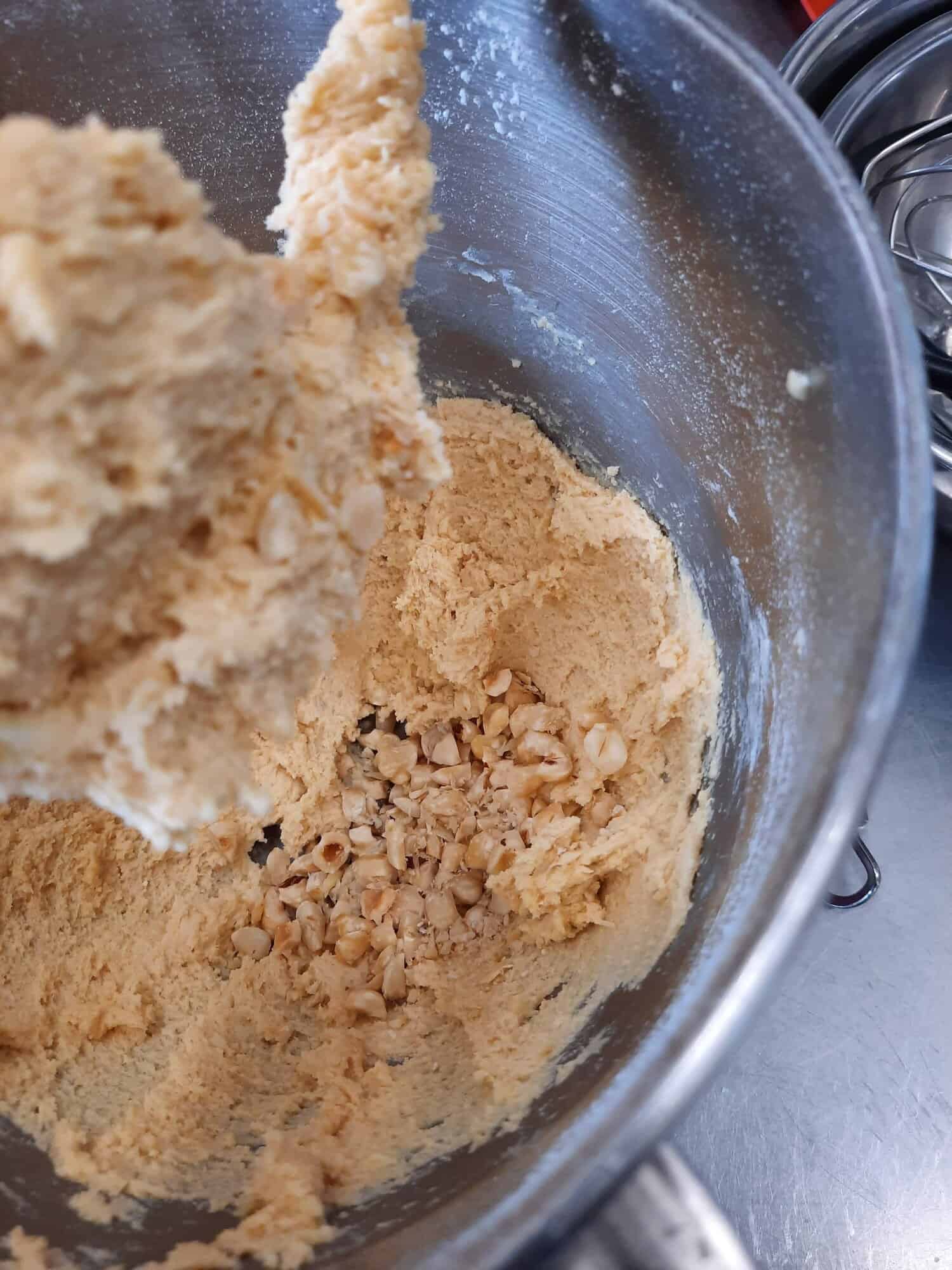 Chop hazelnuts and mix in dough