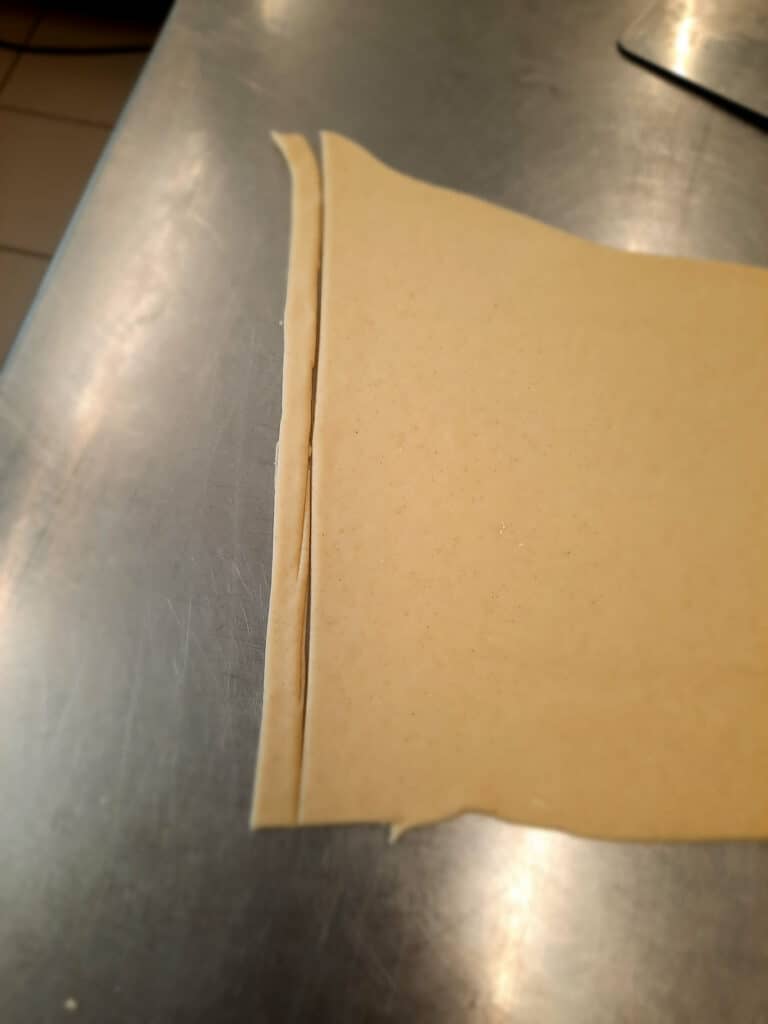 roll out the dough with a rolling pin into a rectangular shape of approx. 5mm thick
cut the dough with a sharp knife into thin strips of 5mm wide